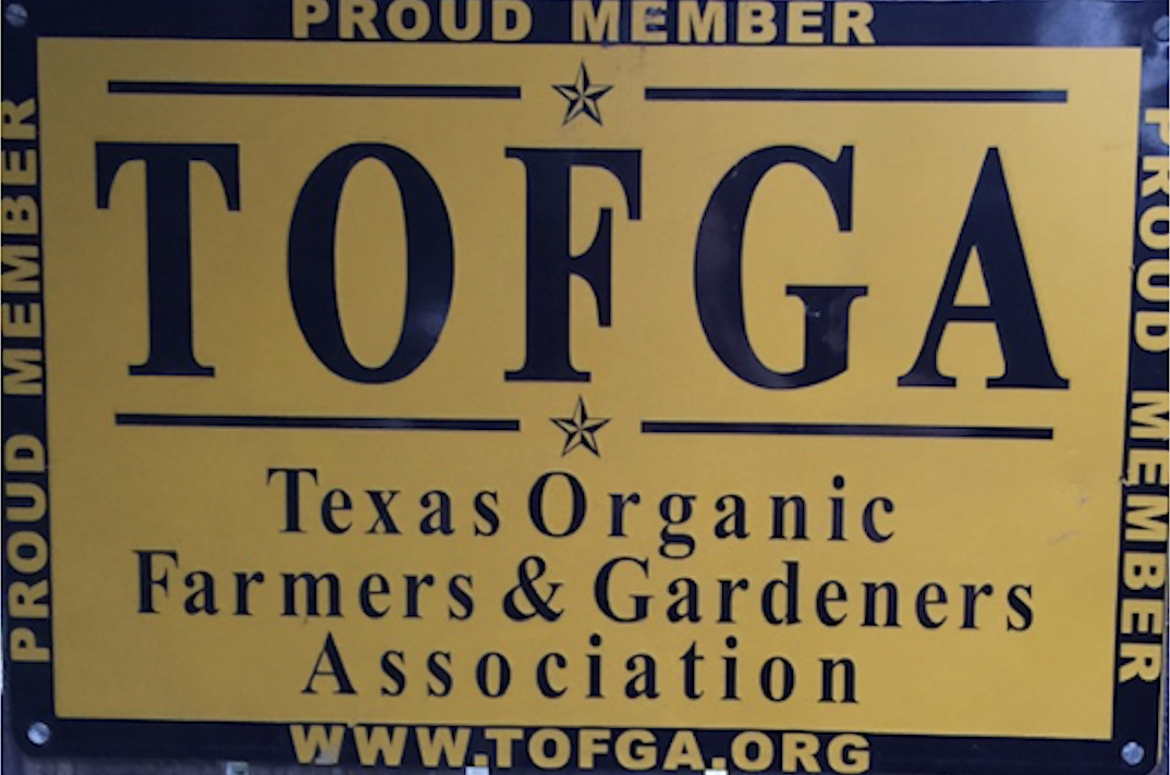 Texas Organic Farmers and Gardeners Association proud member sign